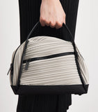 Issey Miyake Pleats Please bias pleats top-handle bag, imported from the UK