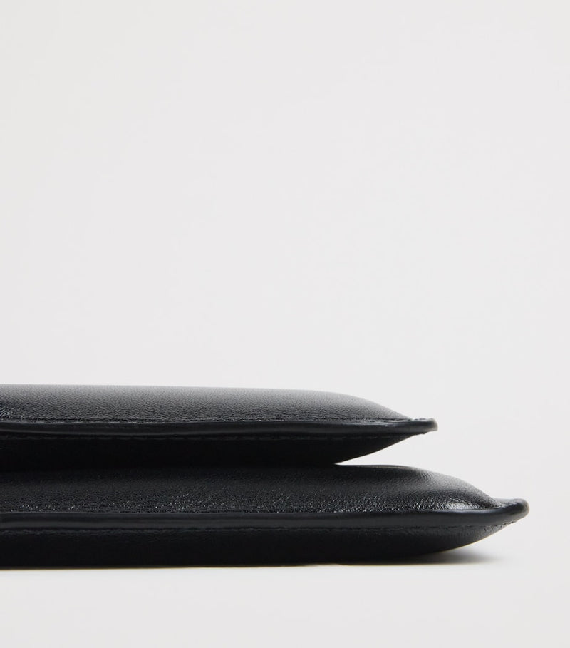 Comme des Garçons medium leather logo wallet, UK version