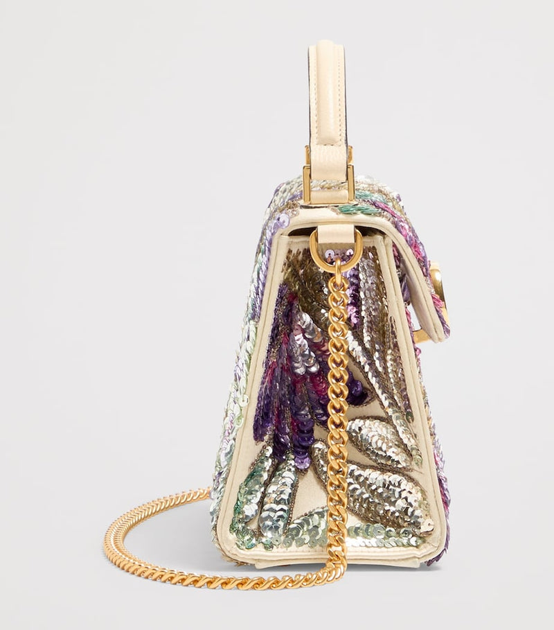 Valentino Garavani mini sequinned VSLING top-handle bag (British brand)