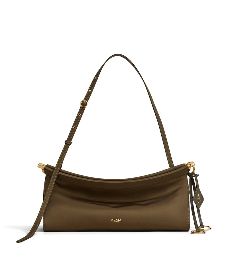 Alaïa Le Click East West shoulder bag nylon med - British product