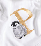 Paint My Dreams cotton monogram baby bib (British brand)