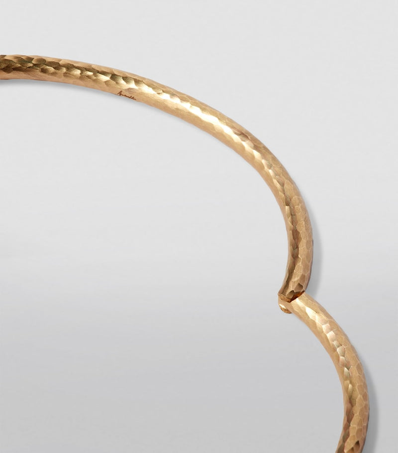 Annoushka yellow gold bangle with hand-hammered finish, imported from the UK