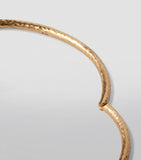Annoushka yellow gold bangle with hand-hammered finish, imported from the UK