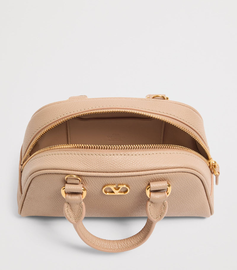 Valentino Garavani mini grained leather VLogo Signature bag, imported from the UK