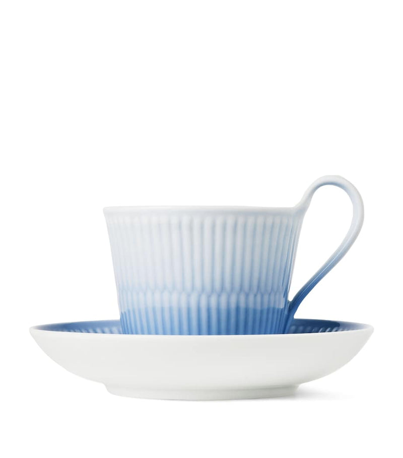 Royal Copenhagen Iris porcelain cup and saucer, H9cm x W15cm, imported from the UK