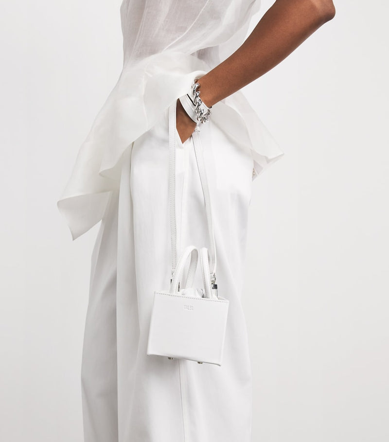 Talel small triangle leather handbag, imported from the UK