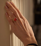 Boodles Masai Mara ring with garnet in yellow gold (British brand)