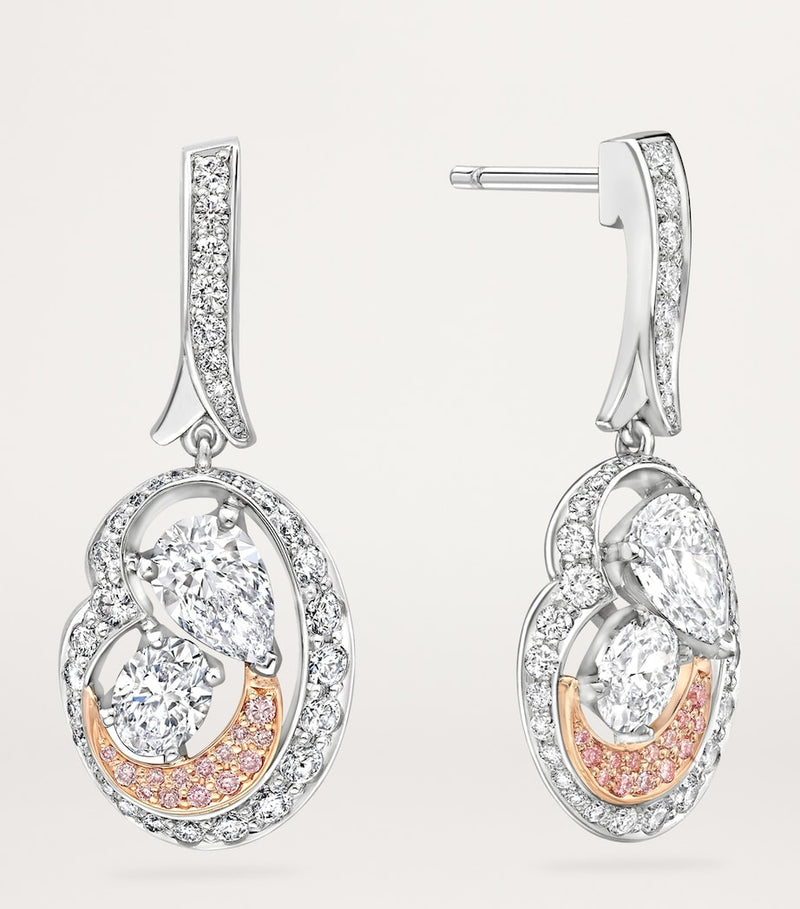 Boodles Motherhood diamond earrings in platinum and rose gold (British brand)