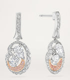 Boodles Motherhood diamond earrings in platinum and rose gold (British brand)