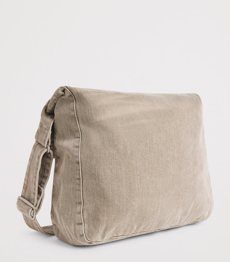 Our Legacy denim sling shoulder bag with mineral pigment, imported from the UK