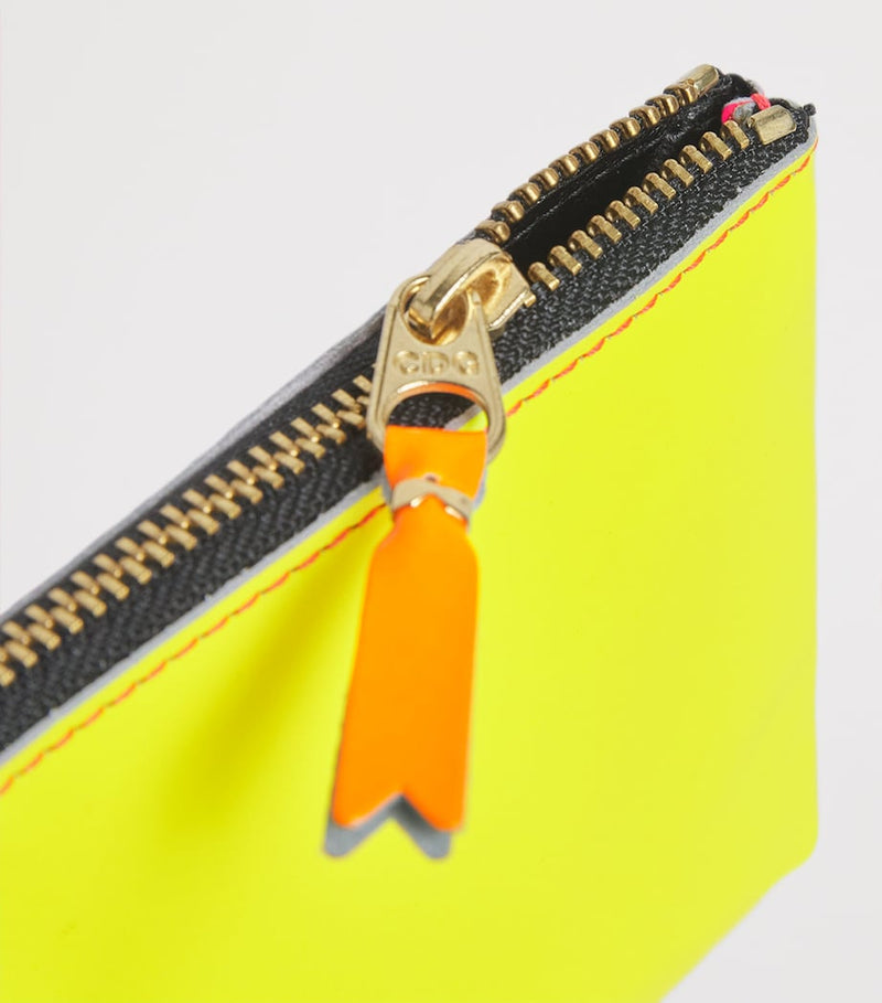 Comme des Garçons Super Fluo small leather wallet, UK version