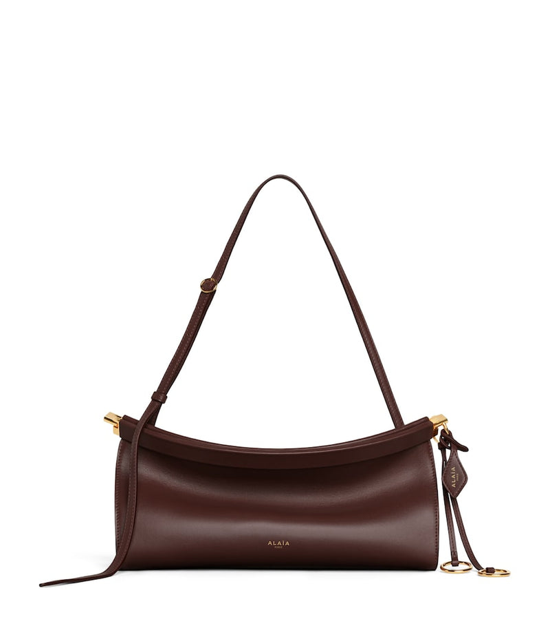 Alaïa medium leather Le Click East West shoulder bag, imported from the UK