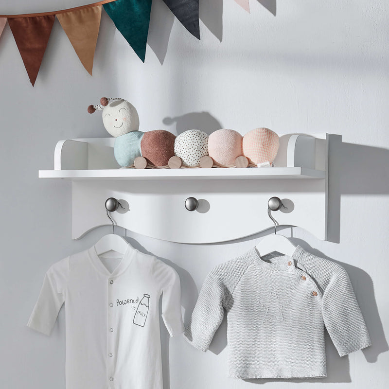 CuddleCo Clara white nursery shelf with pegs - British product