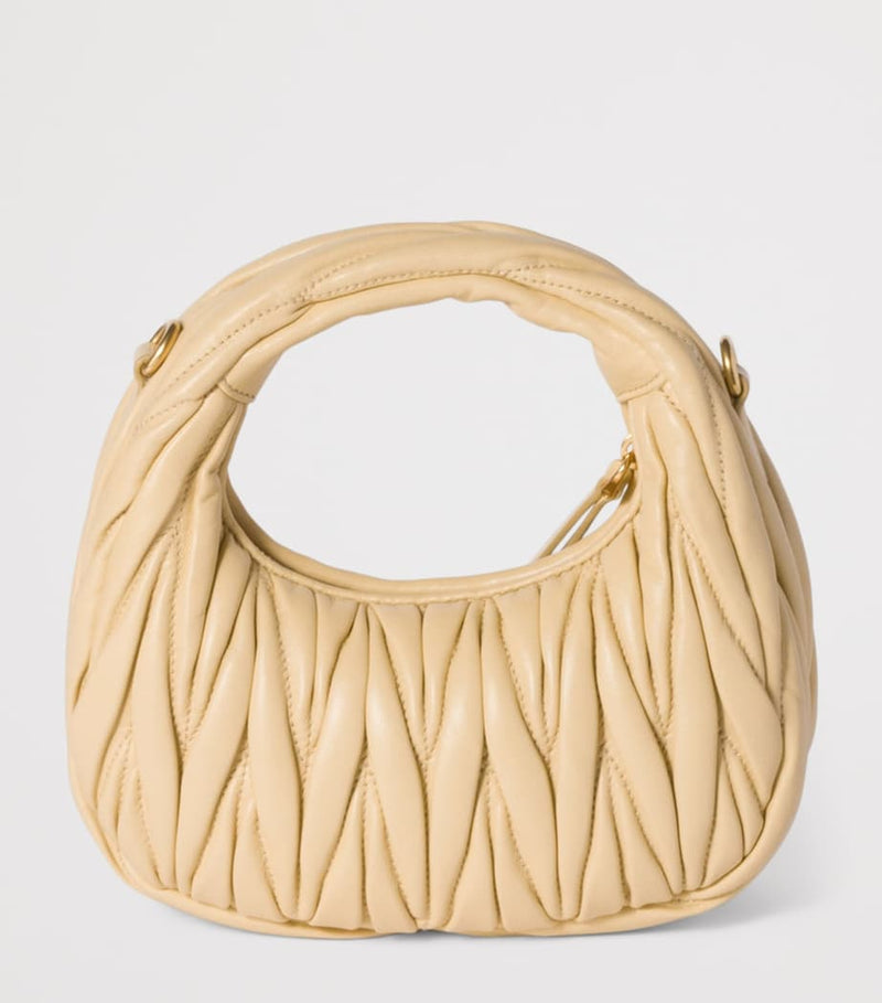 Miu Miu Wander matelassé leather top-handle bag (British brand)