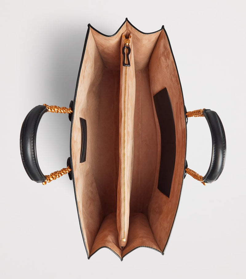 Schiaparelli calfskin face tote bag with anatomical details (British brand)