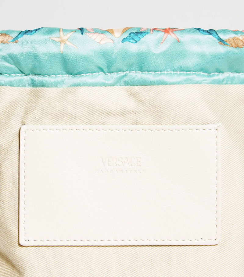Versace Kids drawstring backpack with Underwater Vacanza print, imported from the UK
