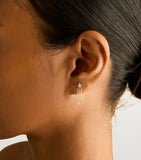 Astrid & Miyu earrings white gold topaz shooting star (British brand)