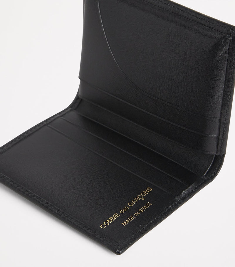 Comme Des Garçons leather wallet with card slots (British brand)