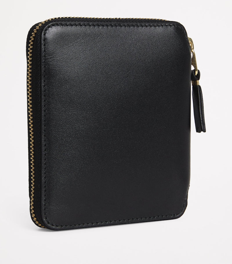 Comme des Garçons zipped leather wallet - British product