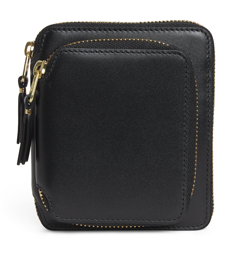 Comme des Garçons zipped leather wallet - British product