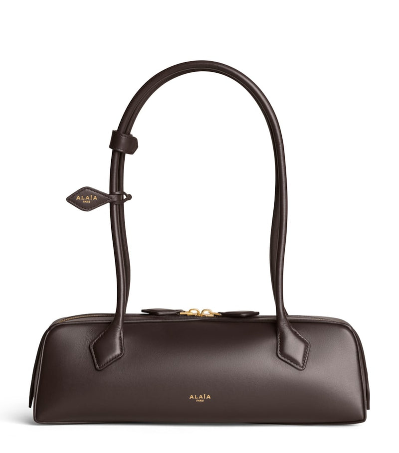 Alaïa Le Teckel shoulder bag in smooth calfskin, imported from the UK