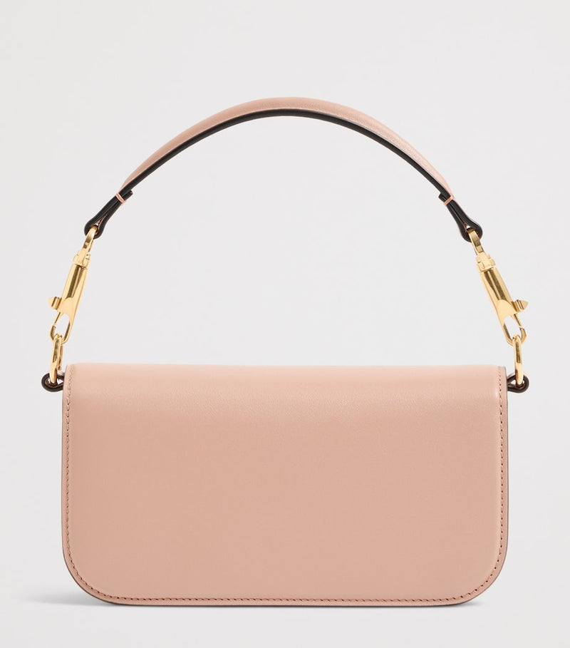Valentino Garavani small Locò leather shoulder bag, imported from the UK