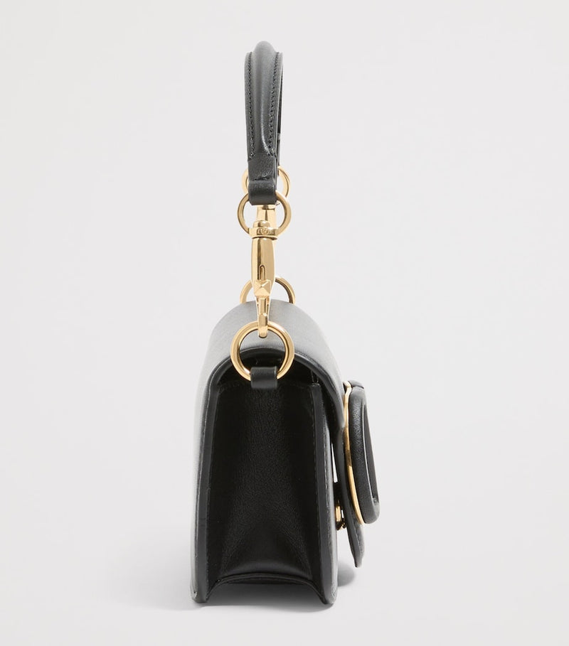 Valentino Garavani Locò small shoulder bag, imported from the UK