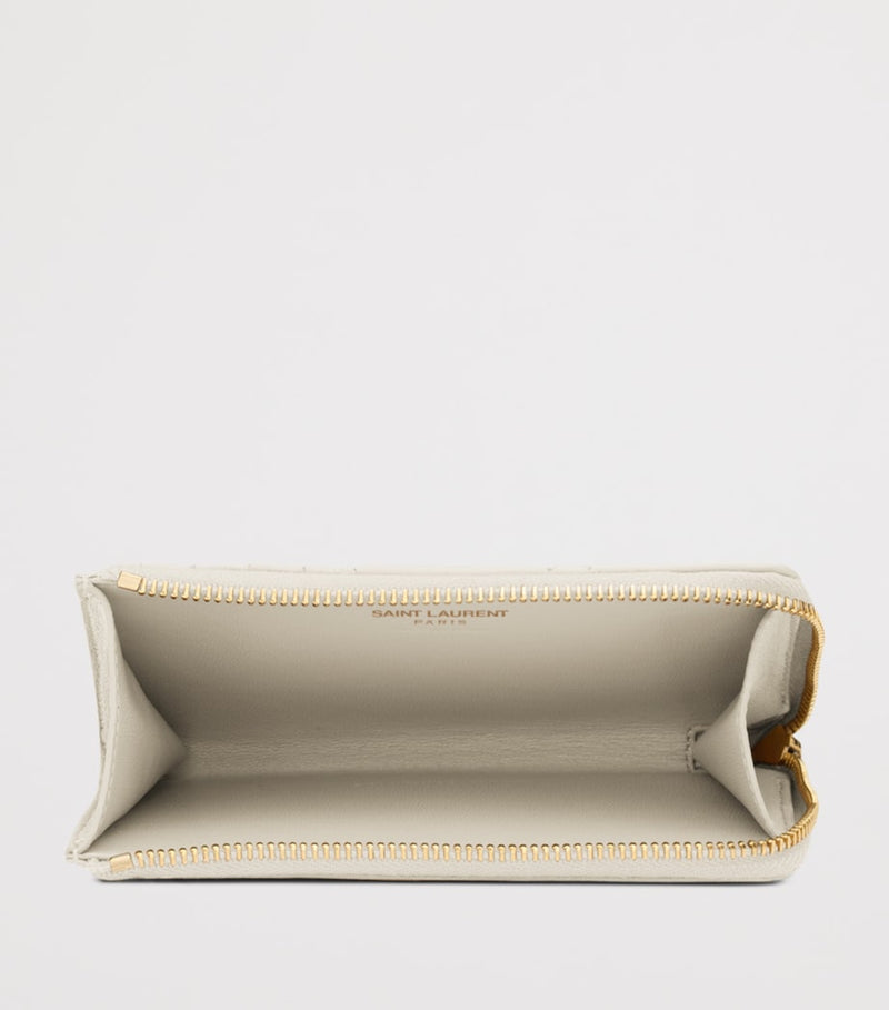 Saint Laurent Matelassé zip-up card holder - British product