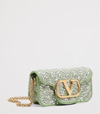Valentino Garavani small Locò embellished shoulder bag, imported from the UK