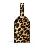 Smythson Panama leather luggage tag with leopard print (British brand)