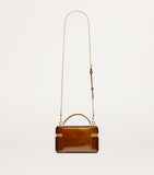 Saint Laurent Gaby patent leather top-handle bag - British product