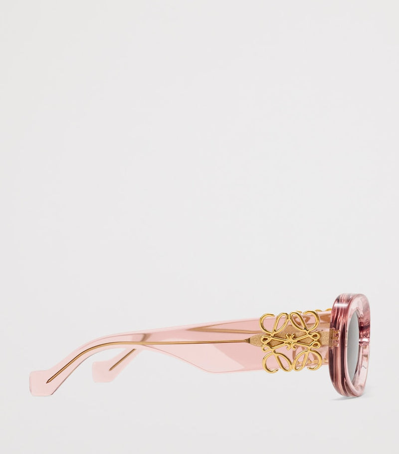 LOEWE oval sunglasses with bevelled acetate frame, imported from the UK