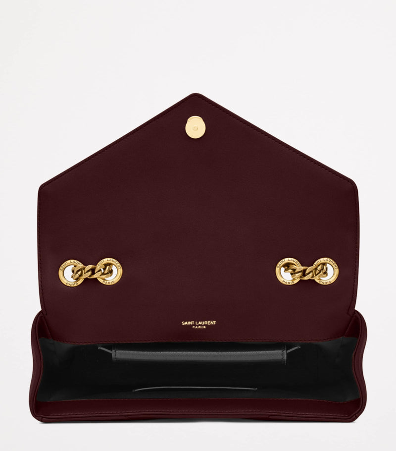 Saint Laurent small Loulou shoulder bag in padded matelassé leather, imported from the UK