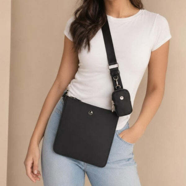 SVNX crossbody handbag with detachable mini pouch black, imported from the UK