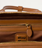 Miu Miu Arcadie top-handle bag in calfskin leather, imported from the UK