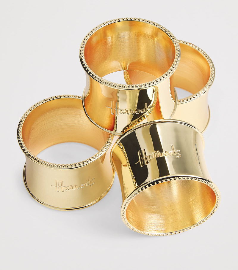 Harrods stainless steel gold-tone napkin rings set of 4, UK version