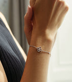 Boodles white gold diamond charm bracelet, imported from the UK