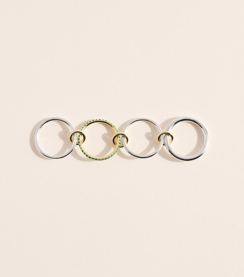 Spinelli Kilcollin Nimbus ring with emeralds, imported from the UK