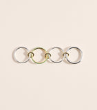 Spinelli Kilcollin Nimbus ring with emeralds, imported from the UK