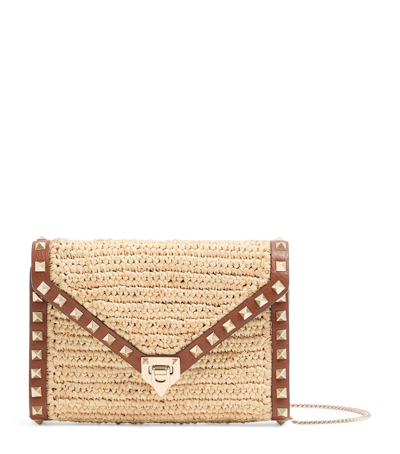 Valentino Garavani mini straw Rockstud cross-body bag - British product