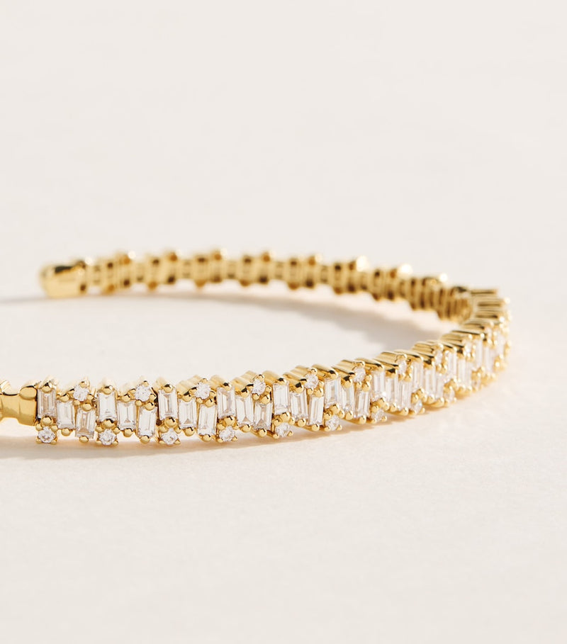 Suzanne Kalan yellow gold and diamond bangle (British brand)