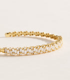 Suzanne Kalan yellow gold and diamond bangle (British brand)