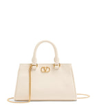 Valentino Garavani VLogo Mini top-handle bag in grained leather (British brand)