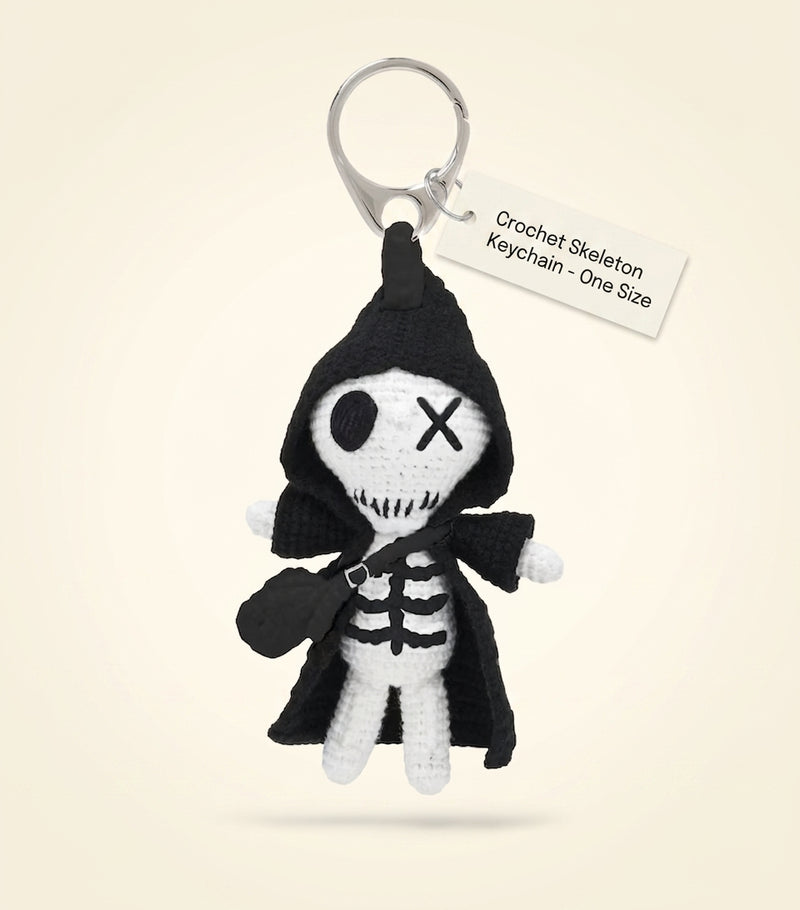 McQueen knitted doll charm hand-crocheted skeleton design (British brand)