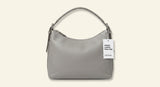 Prada medium leather shoulder bag, imported from the UK