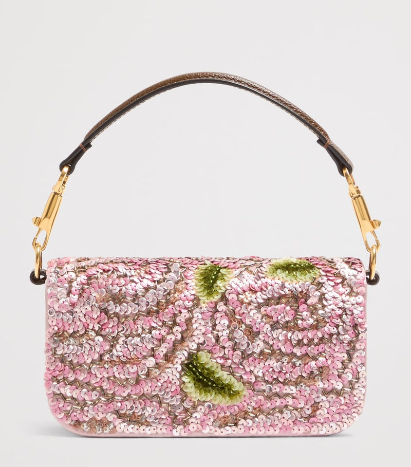 Valentino Garavani small Locò shoulder bag with sequins, imported from the UK