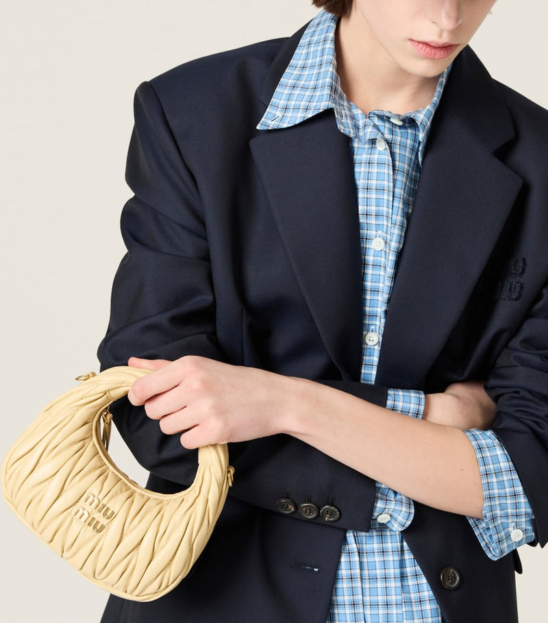 Miu Miu Wander matelassé leather top-handle bag (British brand)
