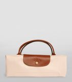 Longchamp small Le Pliage travel bag, imported from the UK