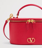 Valentino Garavani mini leather vanity case top-handle bag - British product