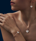 Chopard Happy Hearts drop earrings in rose gold with mother-of-pearl and diamond, UK version